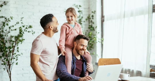 Happy couple with adopted child