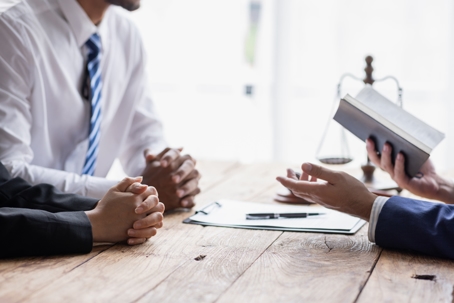 couple consulting with a lawyer