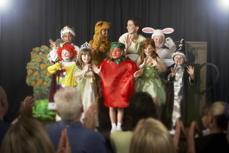 children performing in a school play